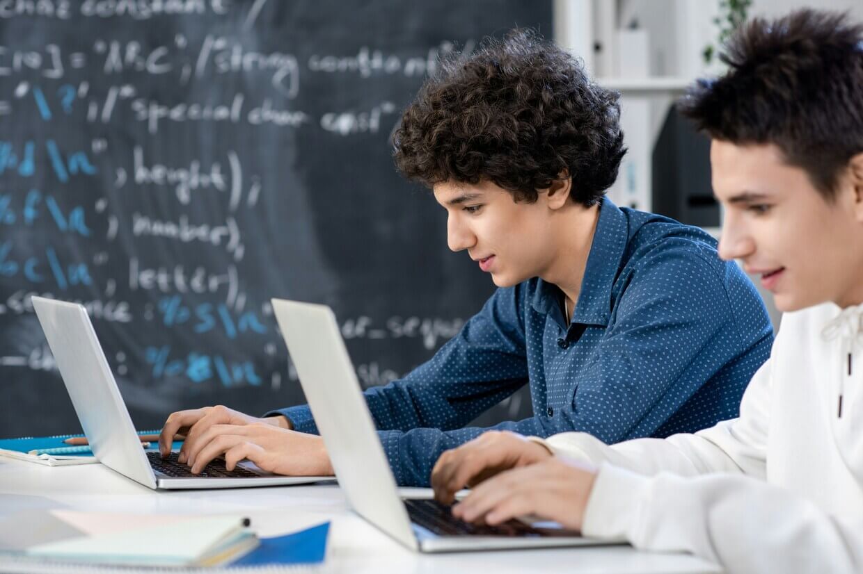Children learning to code together