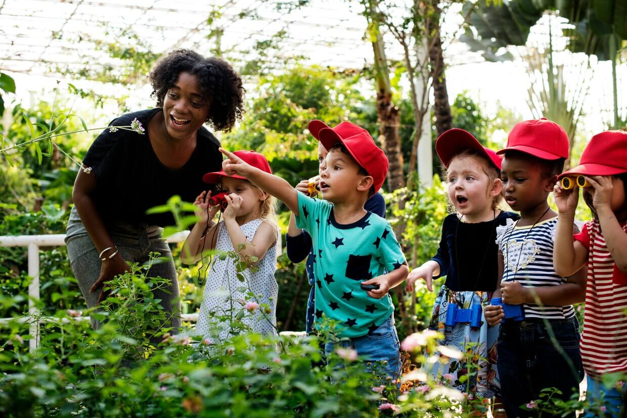 Children learning together in nature